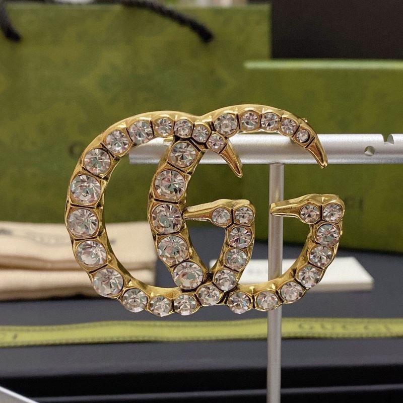 Gvc*1 brooches